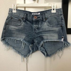 Blue distressed shorts